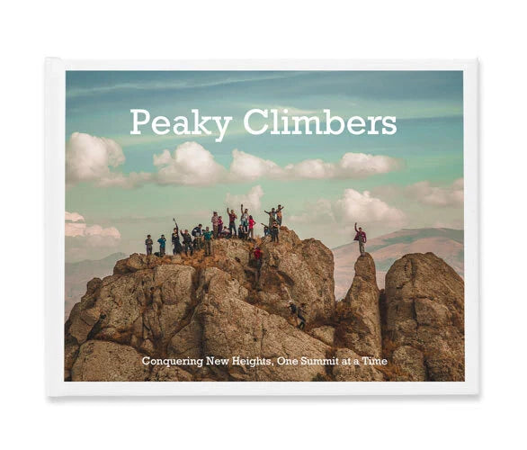Hardcover photo book cover showing group of climbers standing on rocky mountain peak under blue sky with bold title text.