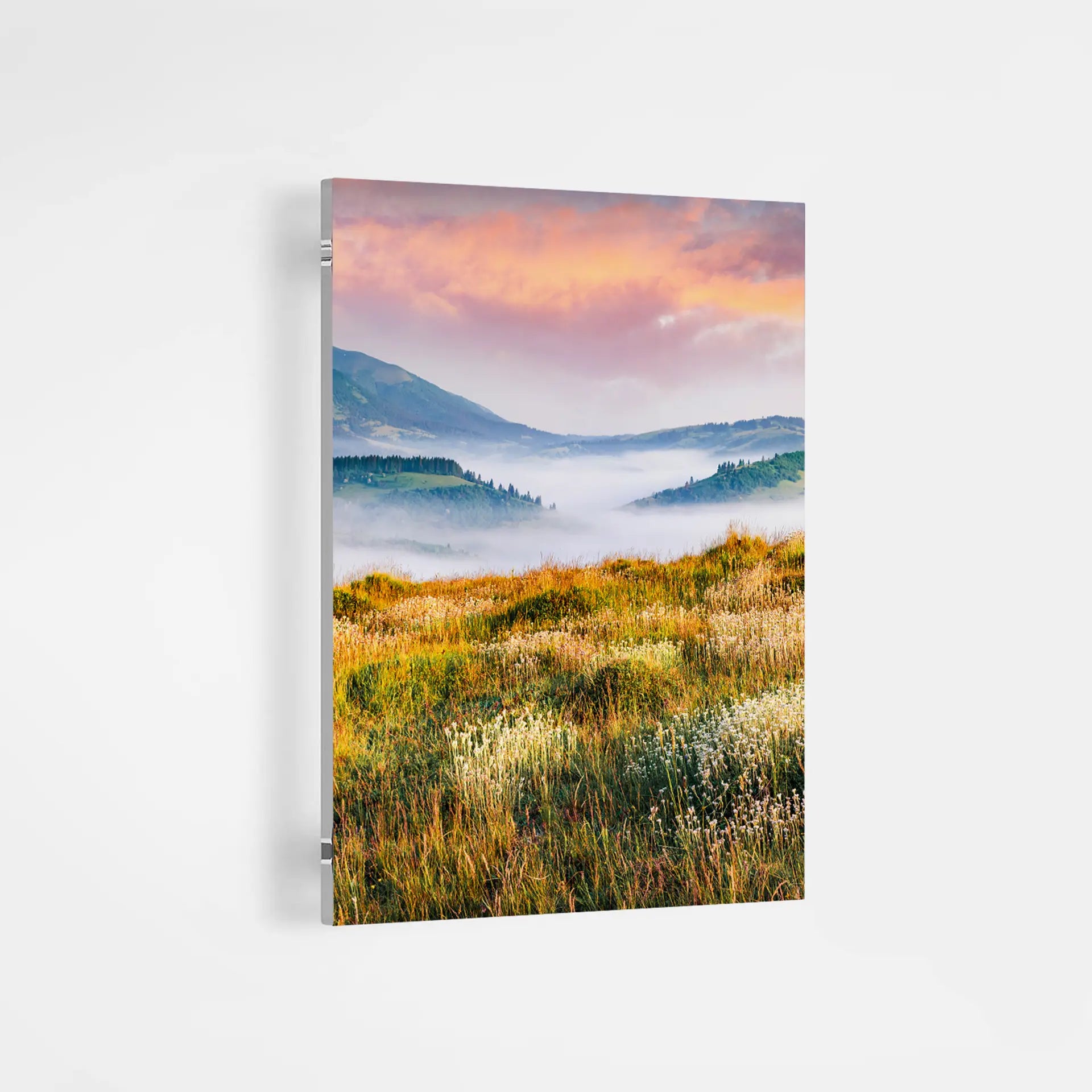 Acrylic photo print of a mountain landscape with a pink and purple sky.