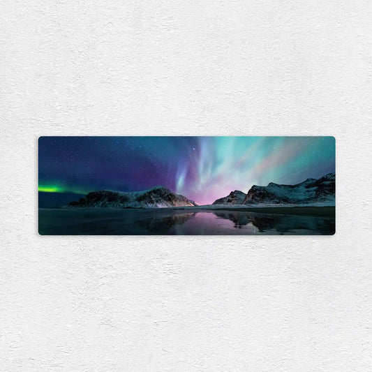 Panoramic metal print view of a mountain landscape with the Northern Lights on a white wall.