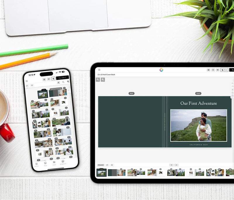 Tablet and smartphone on a desk displaying a photo book cover design titled “Our First Adventure – California 2024,” with editing tools visible.