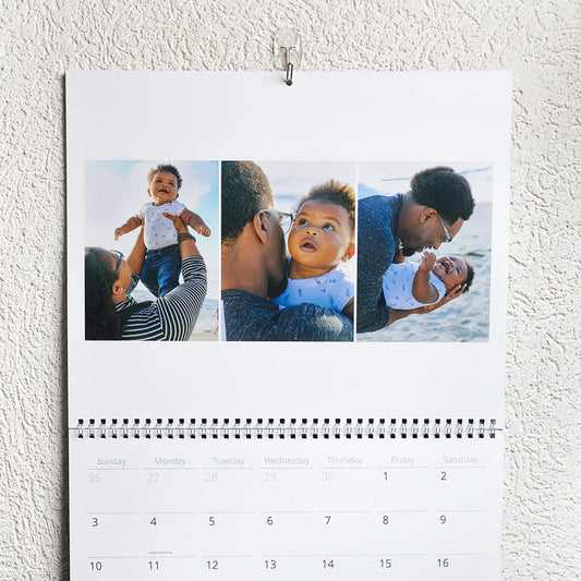 Calendar with family photos on a textured wall