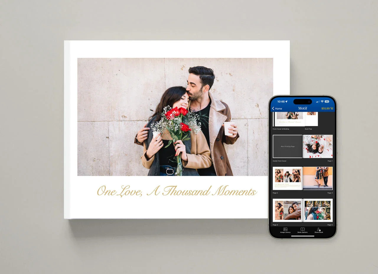 Hardcover photo book with couple portrait and title “One Love, A Thousand Moments” displayed beside smartphone showing photo book editing interface.
